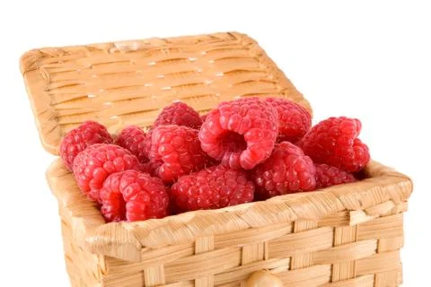 Bast-basket with a raspberry Stock Photos