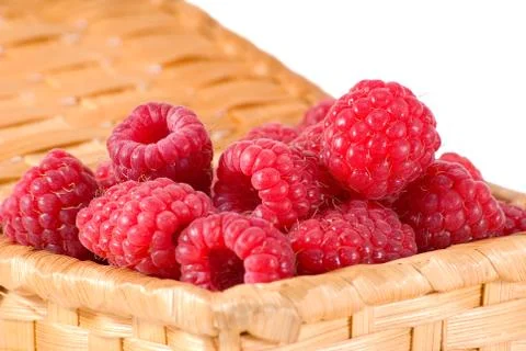 Bast-basket with a raspberry Stock Photos