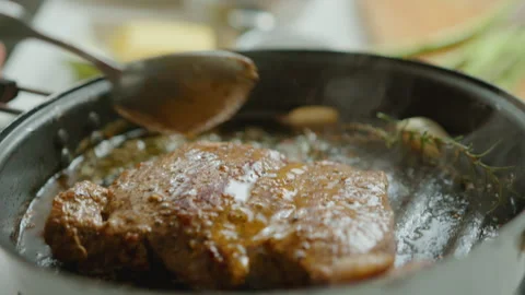Basting Meat Steak with Batter in a Grill Pan Video stock 249837393