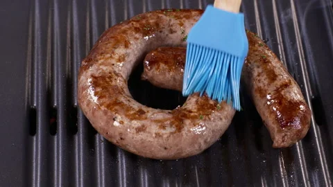 Basting a Ring Sausage Stock-Footage 136207050