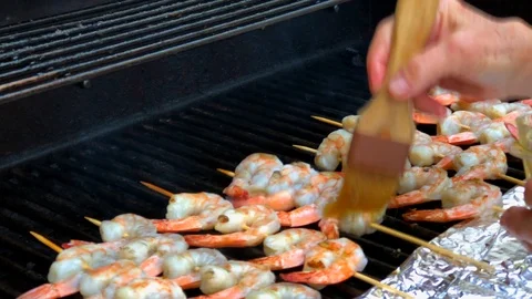 Basting Shrimp on the Grill Video stock 102011037