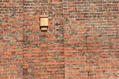 Bat box on an old brick wall Stock Photos