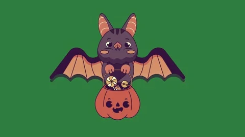 A bat flying over pumpkin on green background and sitting top of green screen Stock Footage 337340406