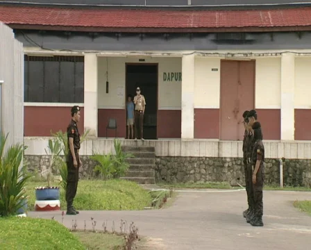 Batam Indonesia prison guards two shot Stock Footage 643978