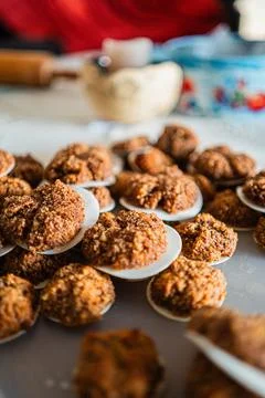 Batch of Brown Macaroons in the Bakery Kitchen on Christmas Stock Photos