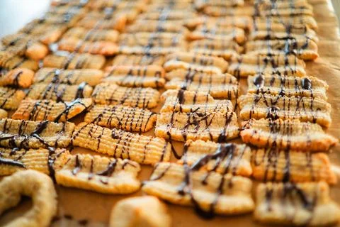 Batch of Delicious Shortbread Biscuits with Choclate Decoration Stock Photos
