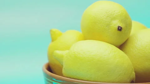 Batch Of Fleshy Lemons With Green On Backdrop Video stock 104108152