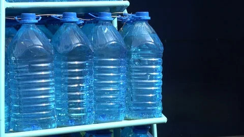 Batch of large plastic bottles with water Stock Footage 114982129