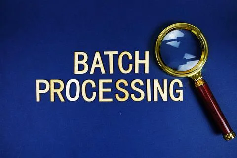 Batch Processing alphabet letters with magnifying glass on navy blue backgrou 库存照片