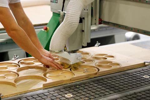 Batch production process with CNC wood router Stock Photos