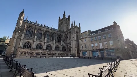 Bath Abbey Exterior with Empty Benches Morning Stock Footage 298110480