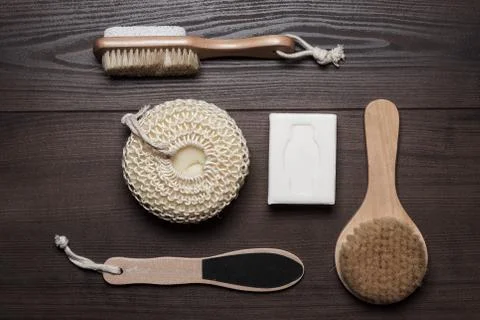 Bath accessories on brown wooden background Stock Photos