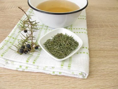 Bath additive from dried juniper leaves Stock Photos