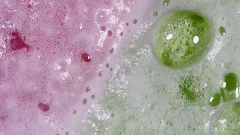 Bath bomb bubbles multiply and expand creating surreal graphic element Stock Footage 334053272