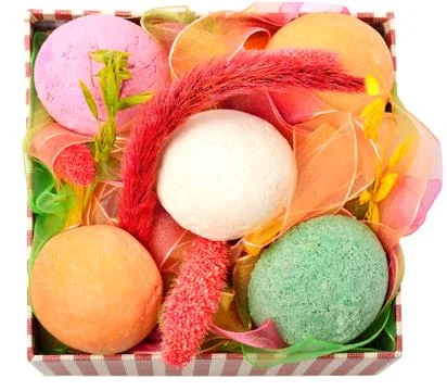 Bath bombs with decor in the box Stock Photos