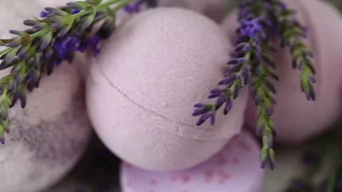 Bath bombs  set and lavender flowers on white shabby chic background. Stock Footage 170472697