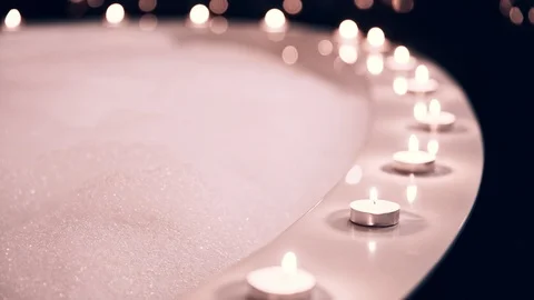 Bath with candles and foam Video stock 99996990