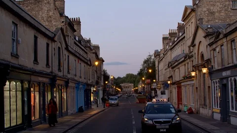 Bath City 4k View down quiet street as taxi approaches evening sunset Stock Footage 106783720