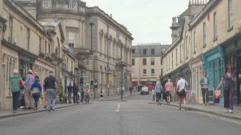 Bath City Centre Argyle Street, on Pulteney Bridge with tourists walking the str Stock Footage 221420445