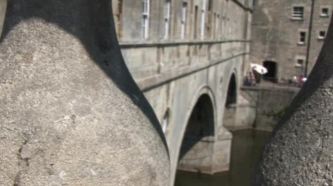 Bath City Pulteney Weir Pull from balcony to bridge wall Stock Footage 653964