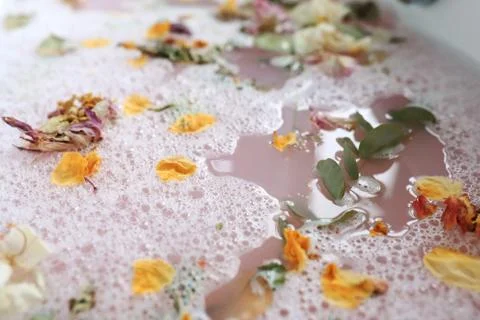 Bath with flower petals Stock Photos
