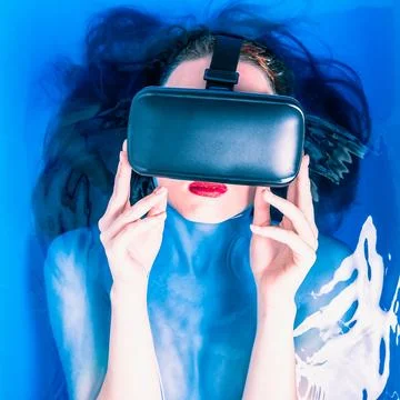 In bath with a gadget Stock Photos