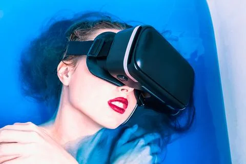 In bath with a gadget Stock Photos