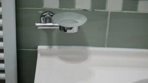 Bath interior, white sink, dryer, shower stall bath interior, white sink, dryer, Stock Footage 235006011