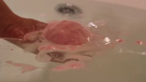 Bath salt ball dissolves Stock Footage 149519771