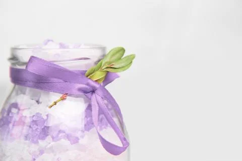 Bath salt with extract of lavender. Lavander sea salt in a glass jar . Organi Stock Photos