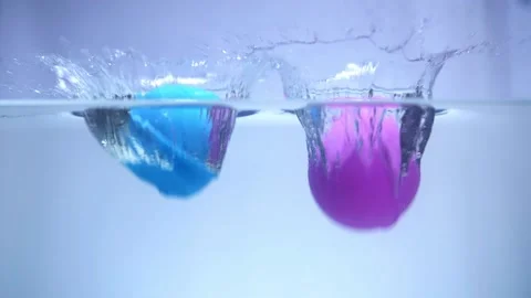 Bath salt falls into the aquarium. slow-motion Stock Footage 154161589