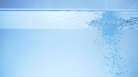 Bath salt falls into the aquarium. slow-motion Stock Footage 154162707