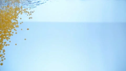 Bath salt falls into the aquarium. slow-motion Stock Footage 154162791