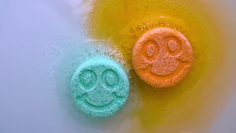 Bath salt figurines bubble in water Stock Footage 154162479