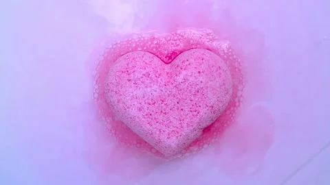 Bath salt figurines bubble in water Stock Footage 154162663