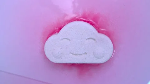 Bath salt figurines bubble in water Stock Footage 154163024