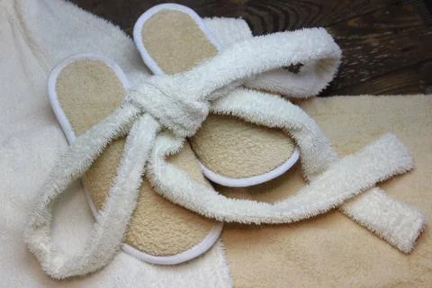Bath slippers and bathrobe Stock Photos