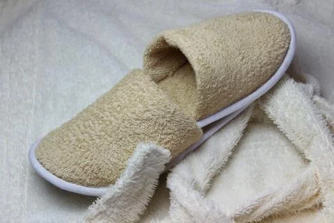 Bath slippers and bathrobe Stock Photos