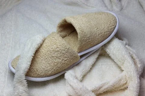 Bath slippers and bathrobe Stock Photos