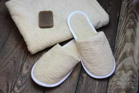 Bath slippers and bathrobe Stock Photos