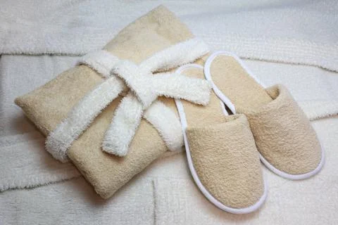 Bath slippers and bathrobe Stock Photos