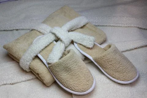 Bath slippers and bathrobe Stock Photos