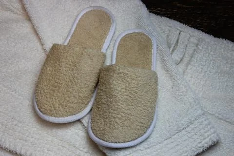 Bath slippers and bathrobe Stock Photos