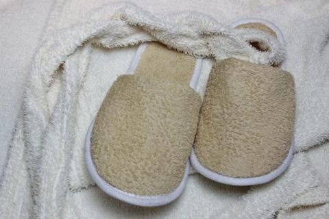 Bath slippers and bathrobe Stock Photos
