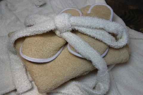 Bath slippers and bathrobe Stock Photos