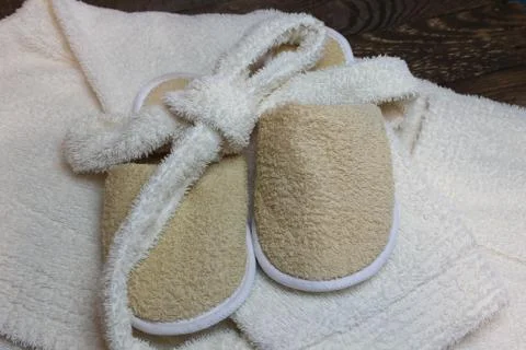 Bath slippers and bathrobe Stock Photos