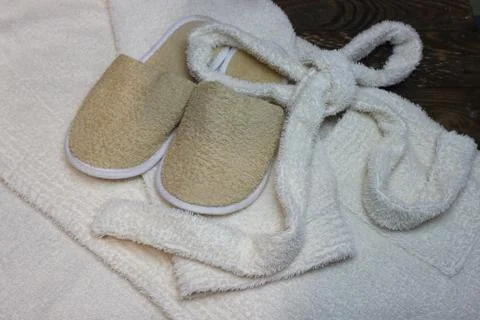 Bath slippers and bathrobe Stock Photos