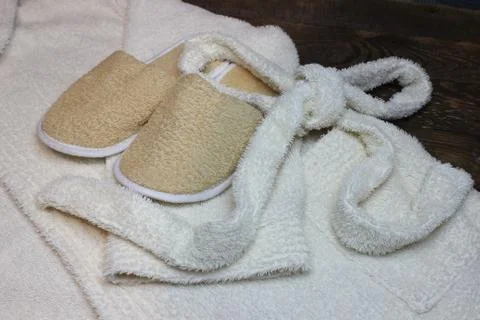 Bath slippers and bathrobe Stock Photos