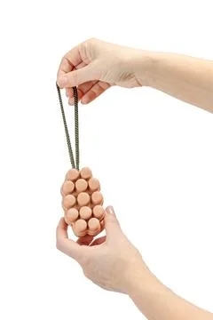 Bath soap in the woman's hands with the white background. Stock Photos