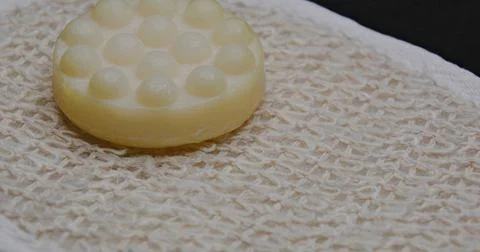 Bath soapy sponge on white background Stock Photos